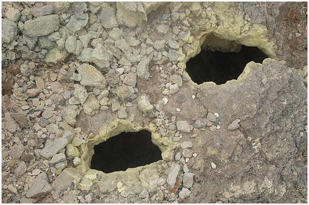 In these two holes at the size of a fist, the water just under a crust of only a few inches are constantly and vividly boiling! - Only 15 cm lelow the surface! - How thick is the crust, I was standing on, when I took this picture?