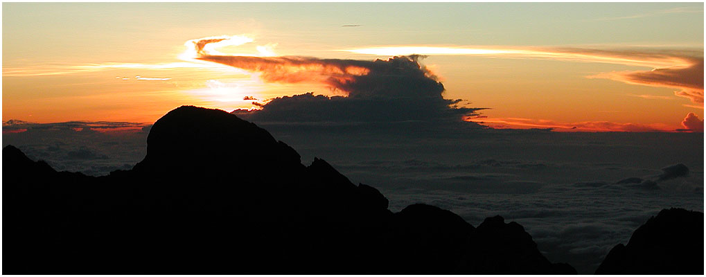 Seconds before sun-up at Low's Peak of Mount Kinabalu at 4101 m above sea level.