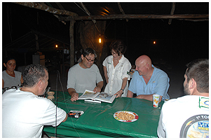 Johnny presents his recent book to Robinho and Maria - and Pedro and Regis. Pictures of previous trips with Robinho are part of the book, and of course he was delighted to be a part of the very much praised tales from Johnny. 