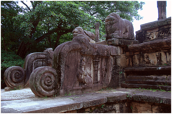 Elephants and lions guard the entrance to this small temple.