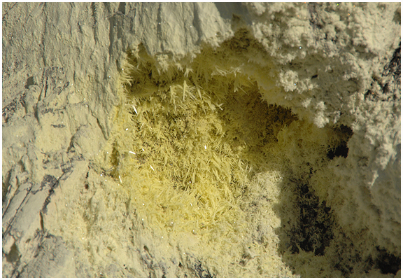 Fine sulfur crystals. No commercial collections are undertaken any more, as it was in the past.